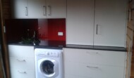 Jan’s kitchen with laundry